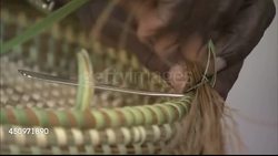 Woman Weaving Wicker Basket News Clip