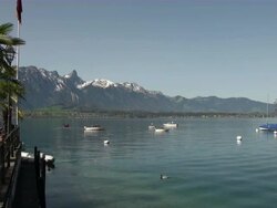 WS Boats passing by thun lake  / Oberhofen, Bernese Oberland, Switzerlan Stock Footage