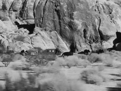 Stagecoaches racing through the desert Stock Footage