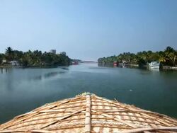 T/L POV Navigating backwaters of Kerala in houseboat / Kollam, Kerala, India Stock Footage