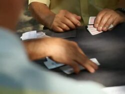Men playing cards Stock Footage