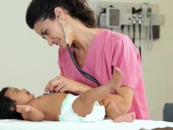 "hispanic medical worker checking heart of hispanic infant patient/Richmond,Virginia, USA " Stock Footage