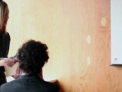 MS TD Businesswoman sitting at office conference table working on digital tablet/Washington, USA Stock Footage