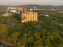WS AERIAL View of abandoned grain storage facility on Tennessee River / Chattanooga, Tennessee, United States Stock Footage