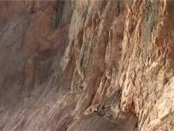 Zoom in To Climber on The Mountain Stock Footage