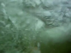 POV of a young man doing a backflip into a river watering hole. - Slow Motion - Model Released - HD Stock Footage