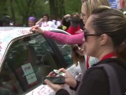 ATMOSPHERE: participants and signage at 15th Annual EIF Revlon Run/Walk For Women Stock Footage