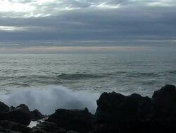 Wave Crashes on Rocks (with sound) Stock Footage