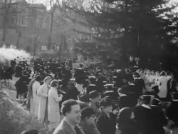 Graduates at Wellesley College roll hoops to determine marriage order Stock Footage