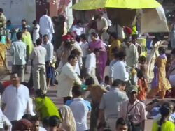 WS PAN Crowds walking on boardwalk / Haridwar, Uttarakhand, India Stock Footage