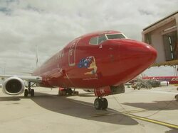 Virgin Blue Boeing 737-800 pushing back, Australia Stock Footage