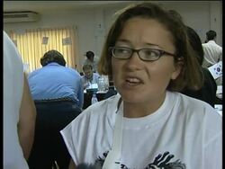 WRAP Foreigners await news at city; injured in hospital; search efforts News Clip