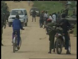 Residents bury bodies, French troops patrol News Clip