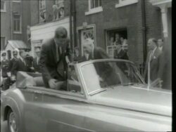 May 6. 1961 FILM MONTAGE MS John F. Kennedy and Harold Macmillan leaving building with Jacqueline Kennedy close behind/ MS Kennedy and Macmillan getting into car/  Stock Footage