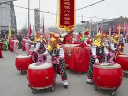 MS Villagers performing gong and drum in traditional festive folk celebration or carnival during chinese spring festival AUDIO / xi'an, shaanxi, china Stock Footage