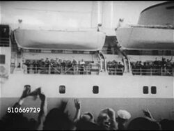 1953: NEW ORLEANS: PORT: Male hands throwing ship's thick mooring rope into water, HA WS (Behind crowd) Cruise ship leaving port, people waving from railing, WS Ship leaving, MS Elder wearing hat labeled 'king' playing Jazz trumpet. Instructional Video