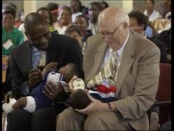 VOICE Mandela, Carter and Gates visit AIDS clinic News Clip