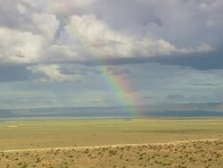 WS AERIAL View of Mogollan Plateau and rainbows / New Mexico, United States Stock Footage