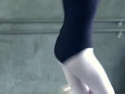 MS TD TU Young ballerina girl holds on to ballet trapeze and spinning fast / Rancho Mirage, California, United States  Stock Footage