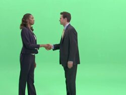 MS, Businesswoman and businessman shaking hands and talking in studio Stock Footage