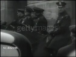 1937: STRIKERS PROTEST: Seamen on strike, walking w/ pickets, sign welcoming SS Roosevelt crew. Mounted police watching.  Strikers walking together. Instructional Video