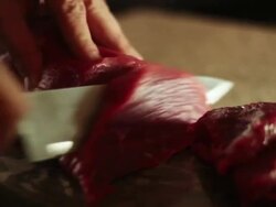 Cutting sirloin beef Stock Footage