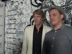 Michael Bay, Tristen Eaton at the 2011 Maxim Hot 100 Party With New Era, Miller Lite, 2(x)ist And Silver Jeans Co. at Hollywood CA. (Footage by WireImage Video/GettyImages) Stock Footage