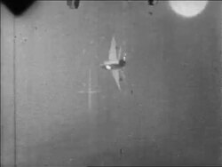 B/W 1967 military aircraft point of view thru crosshairs of MIG exploding in Six Day War / newsreel Stock Footage