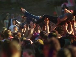 young people covered in colored powder and celebrating Stock Footage