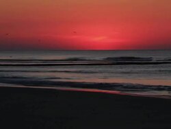 Sunrise time lapse with runners and fishermen Stock Footage