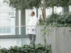 WS Two physicians in hospital atrium talk casually / Seattle, Washington, USA Stock Footage
