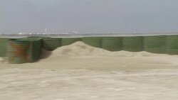 Sand drifts against miles of beach barriers in Fourchon, Louisiana. Stock Footage