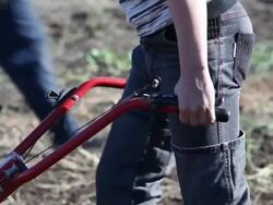 Operator ploughing soil Stock Footage
