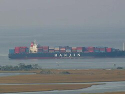 MS AERIAL Shot of Container ship going to wilmington harbor / North Carolina, United States Stock Footage