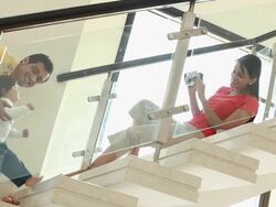 Father helping to walk his baby  Stock Footage