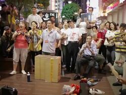 MS People singing in Nanjing Dong Road AUDIO / Shanghai,  China Stock Footage