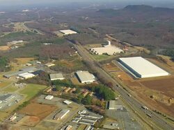 WS AERIAL View of highway and industrial area / North Carolina, United States Stock Footage