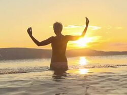 HD SUPER SLOW MO: Woman In Shallow Water Stock Footage