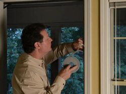 Installing Weather Stripping for Energy Efficiency Stock Footage