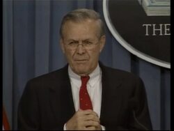Rumsfeld briefing on Saddam interrogation, Iraq contracts News Clip
