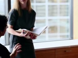 MS PAN TU Three coworkers in discussion in conference room/Washington, USA Stock Footage