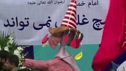 CLEAN : Flag burning Iranians mark US embassy seizure in Tehran News Clip