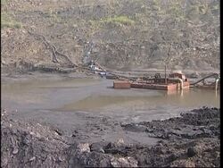 Visiting PM Kim Yong Il visits coal mine News Clip