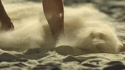 HD Super Slow-Mo: Sliding Barefoot On Sand Stock Footage