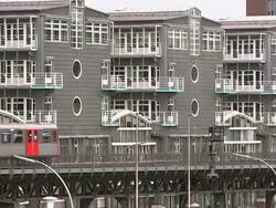 MS Shot of Hochbahn (city railway) passing in front of GrunerJahr Building / Hamburg, Germany  Stock Footage