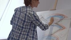 Woman artist drawing in art studio Stock Footage