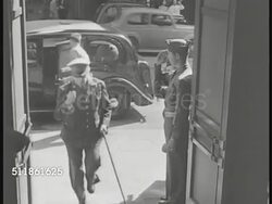 1942: MACARTHUR IN AUSTRALIA:'Headquarters US Army Forces' sign, TU US Flag. Recalled US General MacArthur out of car & into building. PAN Crowd outside. MacArthur out of car, walking steps, shaking hands w/ Prime Minister John Curtain in office. WWII Instructional Video