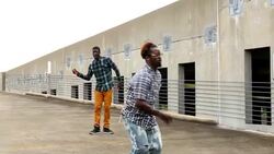MS Group of friends watching man dance on rooftop Stock Footage