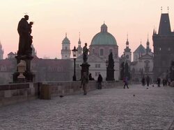 MS People walking on charles bridge at morning and pink glow sky background  / Prague, Hlavni mesto Praha, Czech Republic Stock Footage