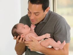 MS TU Father Holding Newborn Baby / Richmond, Virginia, USA Stock Footage
